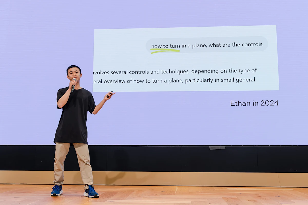 A speaker presenting a project at an OpenAI community event.
